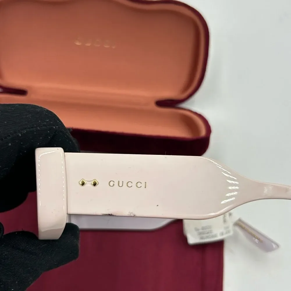 Women's Gucci 53 mm rectangular  sunglasses made in Italy